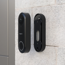 Reolink Mounting Bracket & Wedge for Video Doorbell (Battery) in black, installed on exterior wall for angled camera positioning.