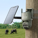 Solar-powered security camera attached to a wooden post with cows grazing in the background. Reolink TrackMix LTE-C | 4G Dual-Lens Security Camera with Auto-Zoom Tracking | Camo | Connect It Ireland
