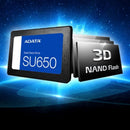 ADATA SU650 solid state drive shown in a black rectangular form with a blue label, alongside stacked black 3D NAND Flash modules, set against a glowing blue space-like background.