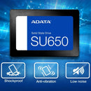 ADATA SU650 solid state drive shown on a blue tech-style background with three feature icons below: shockproof, anti-vibration, and low noise.